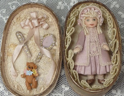 Doll in an oval box